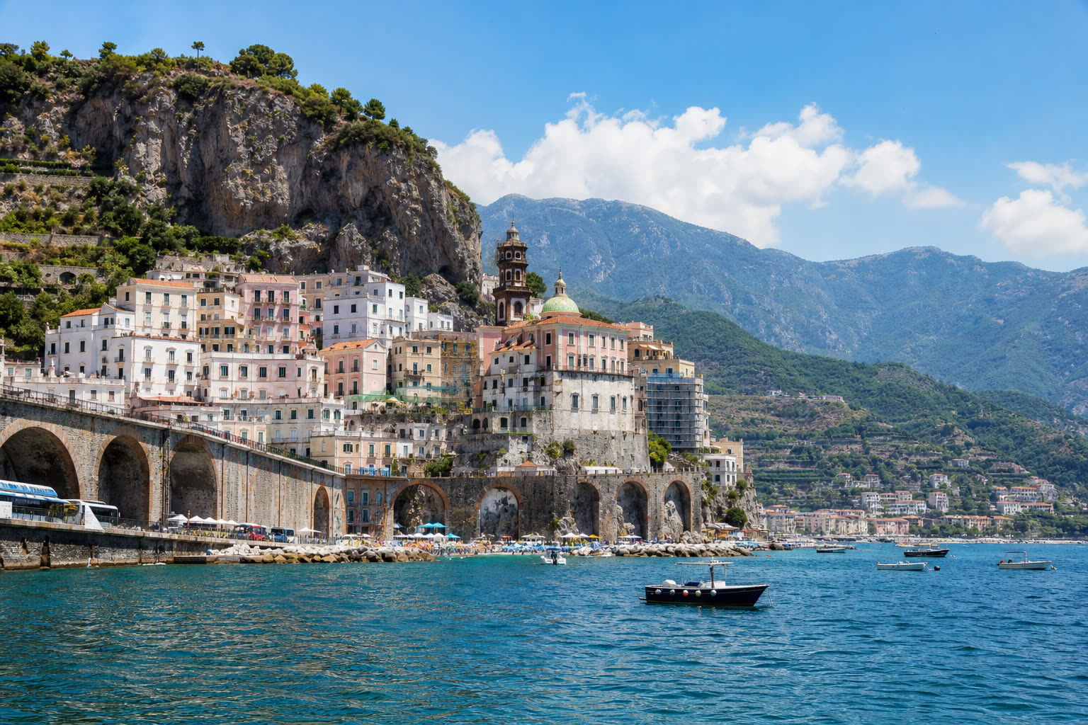 Amalfi Coast towns stacked above the sea, the southern Italy scale that romance books set in Rome sometimes make readers hungry for next
