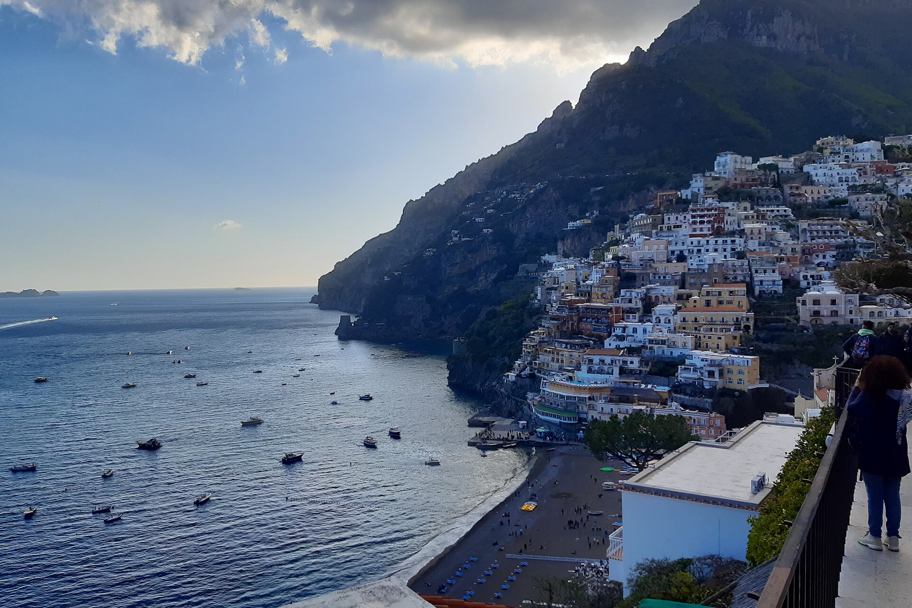 Positano on the Amalfi Coast stacked above the sea, the frank coastal light of love after loss romance books set in Italy