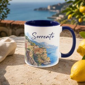 Sorrento accent coffee mug with navy interior on a terrace overlooking the sea