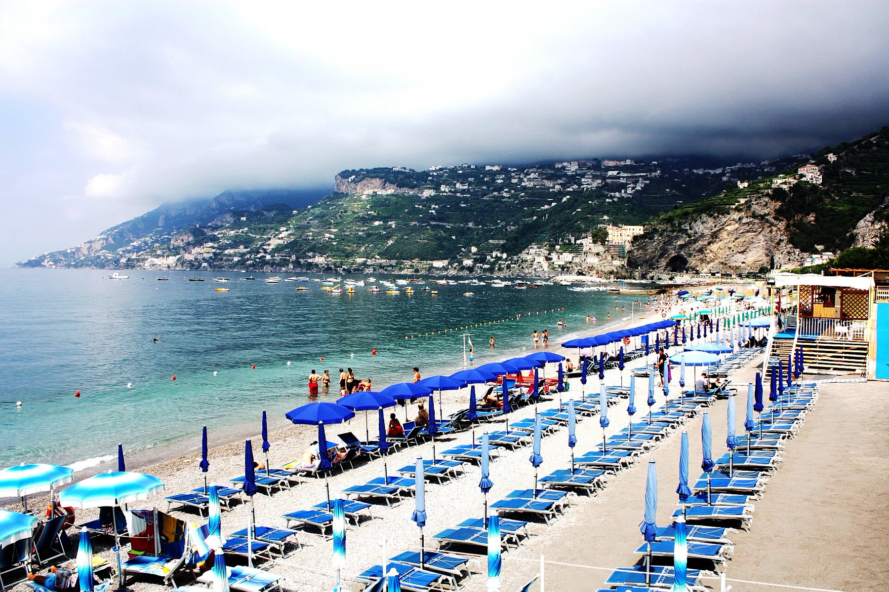 Shared shore for Amalfi Coast pebble beach with pebble-labor climate still named