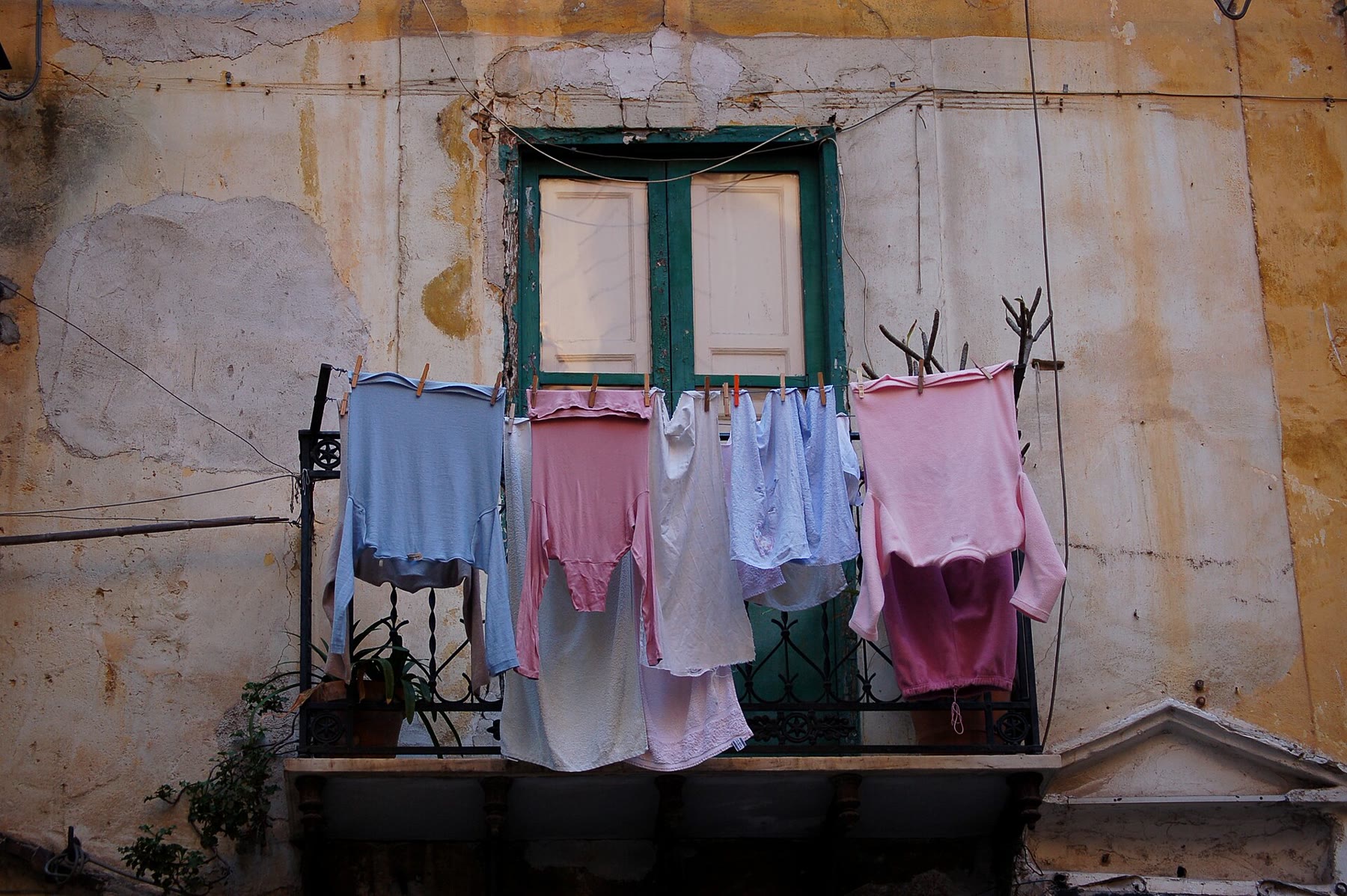 Street view of drying laundry for Amalfi Coast laundry for romance readers with balcony clothesline climate still named