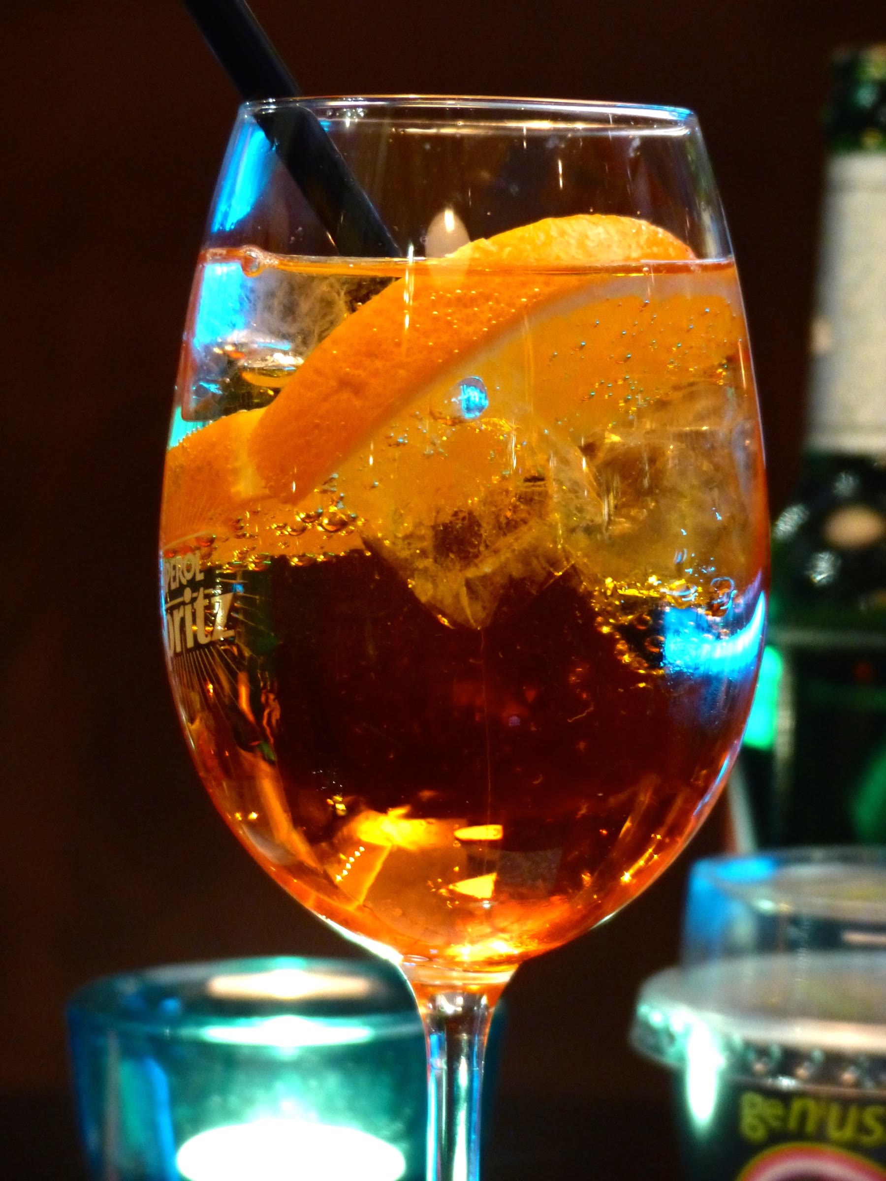 Italian aperitivo romance Aperol spritz glass with evening-drink honesty and public climate still named