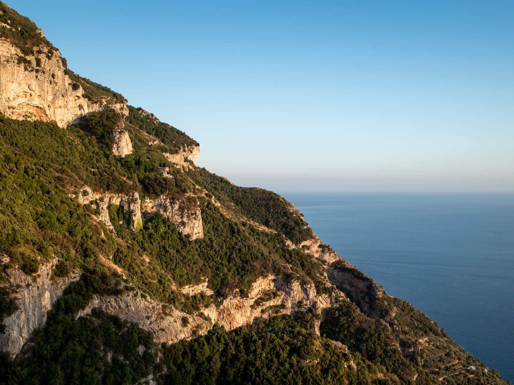 Path of the Gods cliff trail height where Capri can sit across the water on a clear day