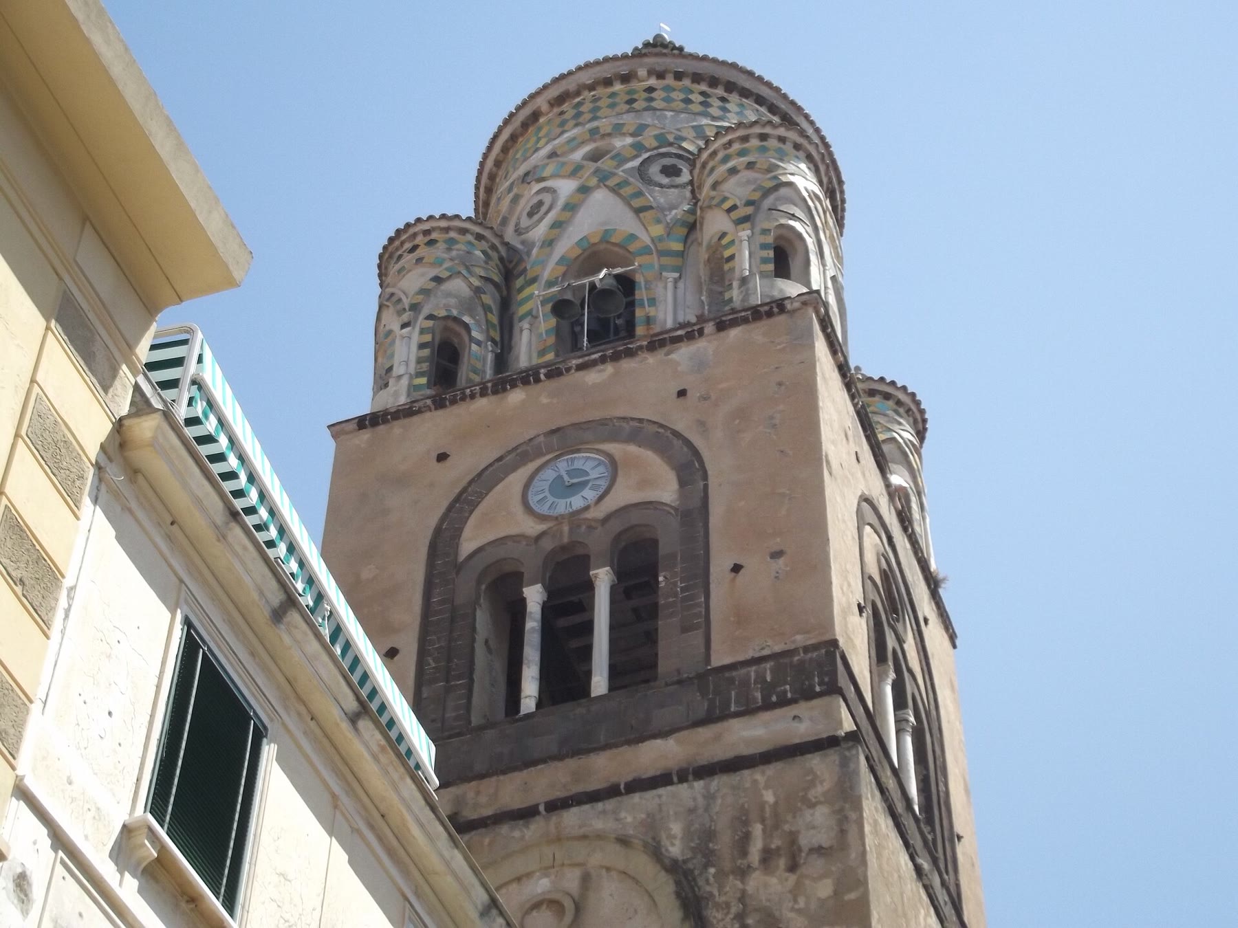 Amalfi Coast church bells for romance readers with bell-hour civic climate and living campanile still named