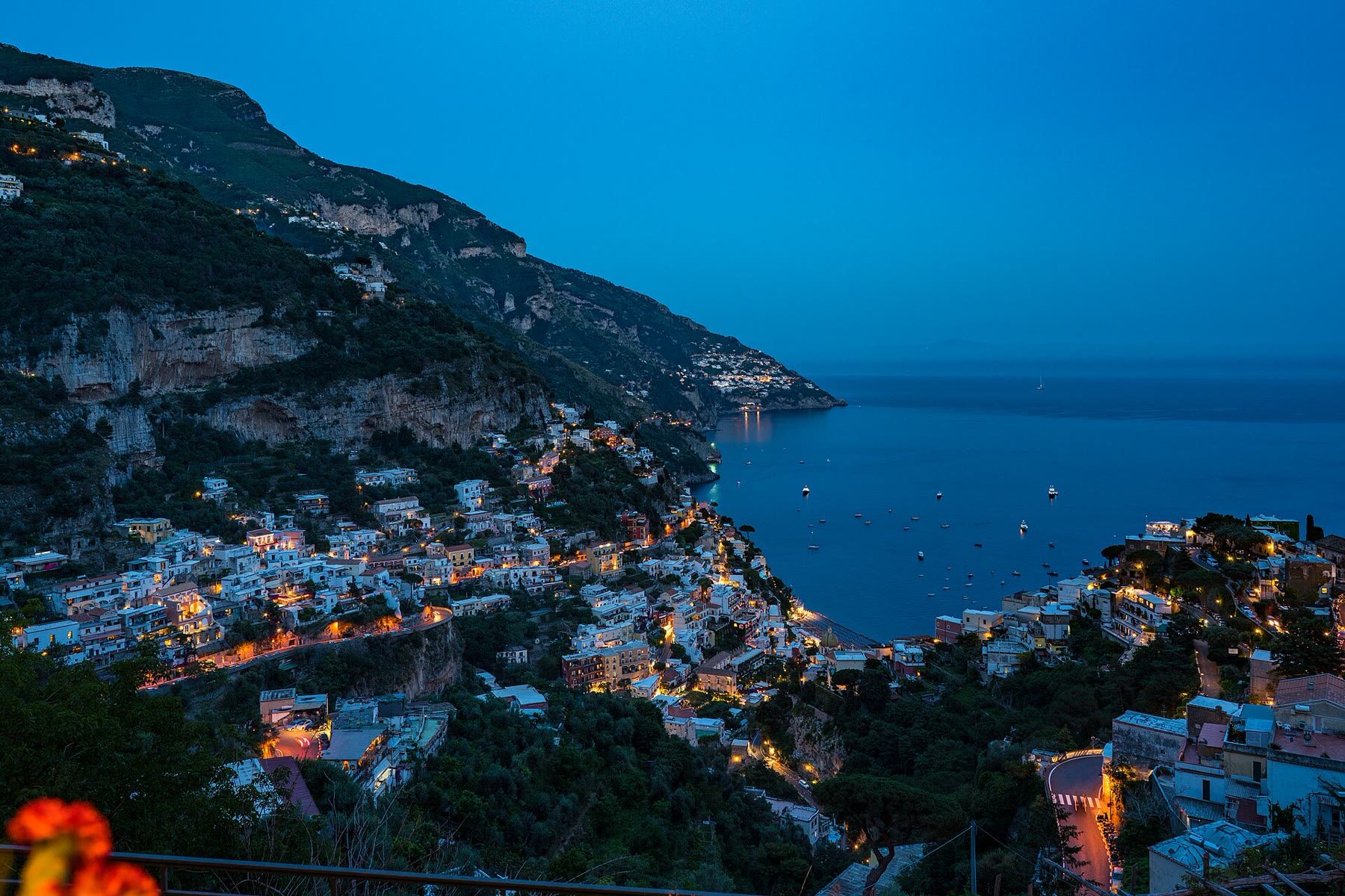 Evening in Amalfi for romance readers with night-square climate and living lamps still named