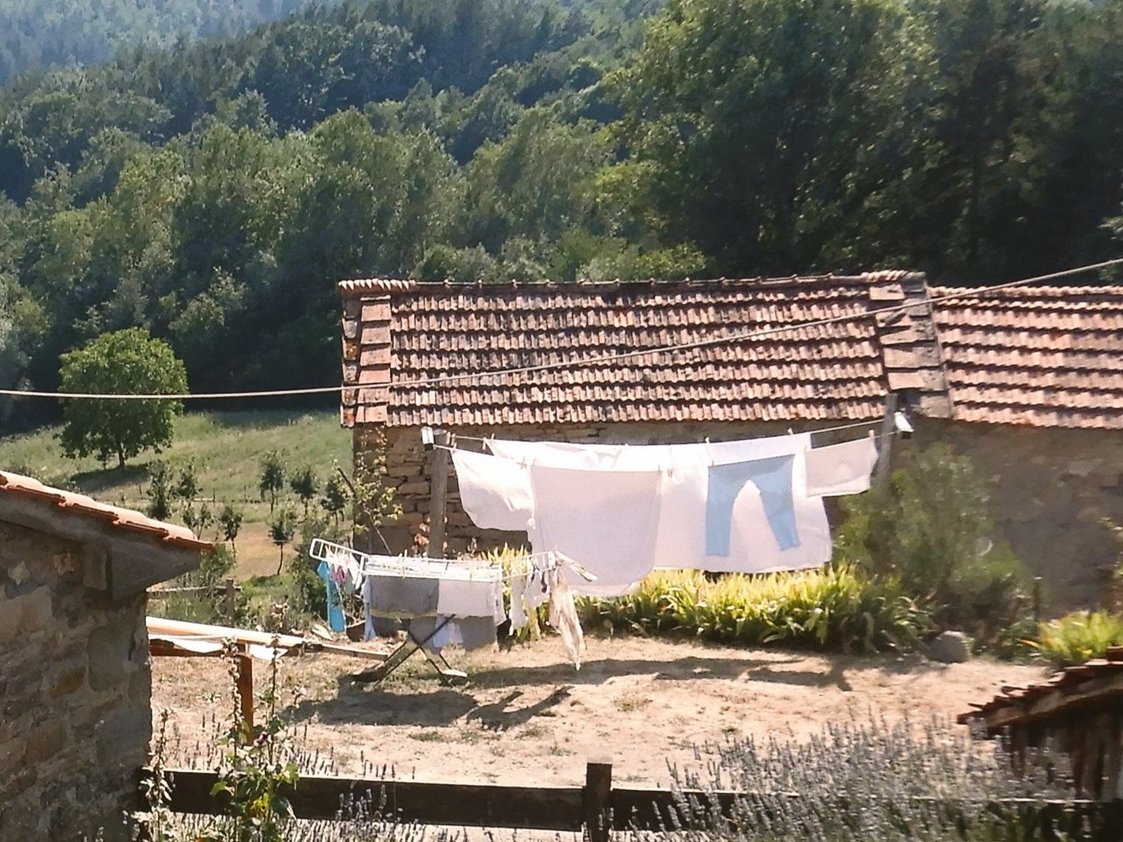 Italian balcony romance with shared-balcony climate and neighbor density across rails still named