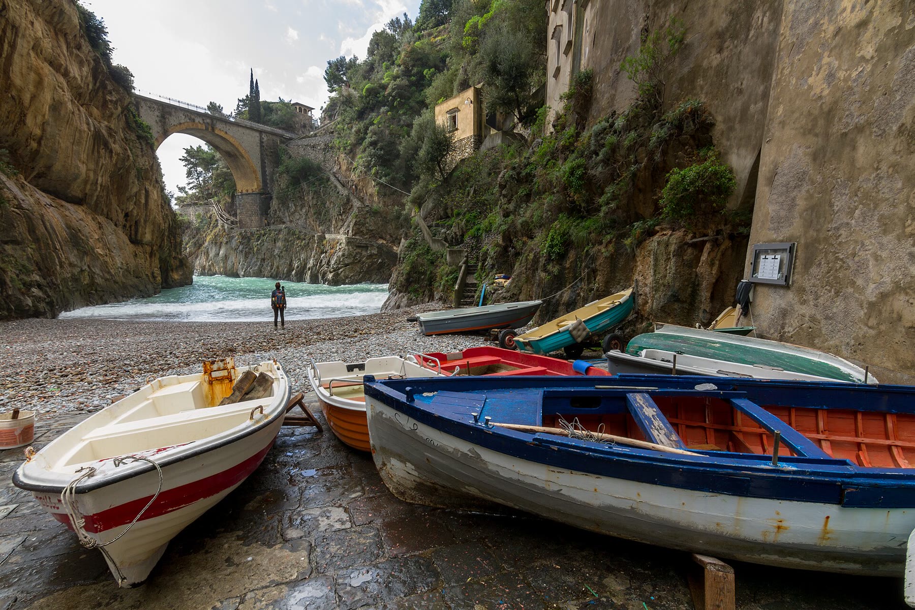 Marina di Praia for romance readers with pocket-cove climate and living pebble beach still named