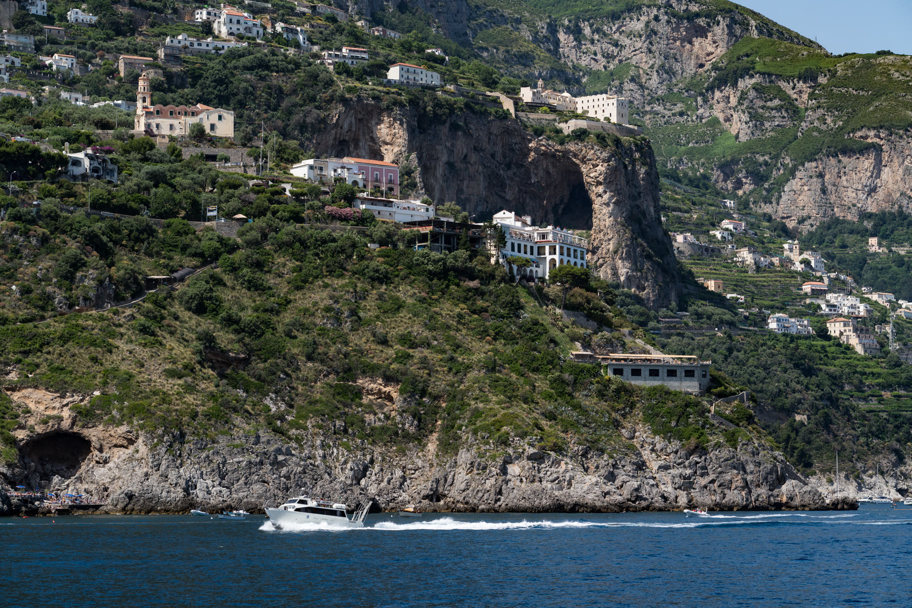 Ferry ride along the Amalfi Coast toward Positano cliffs, ferry approach for Positano romance readers