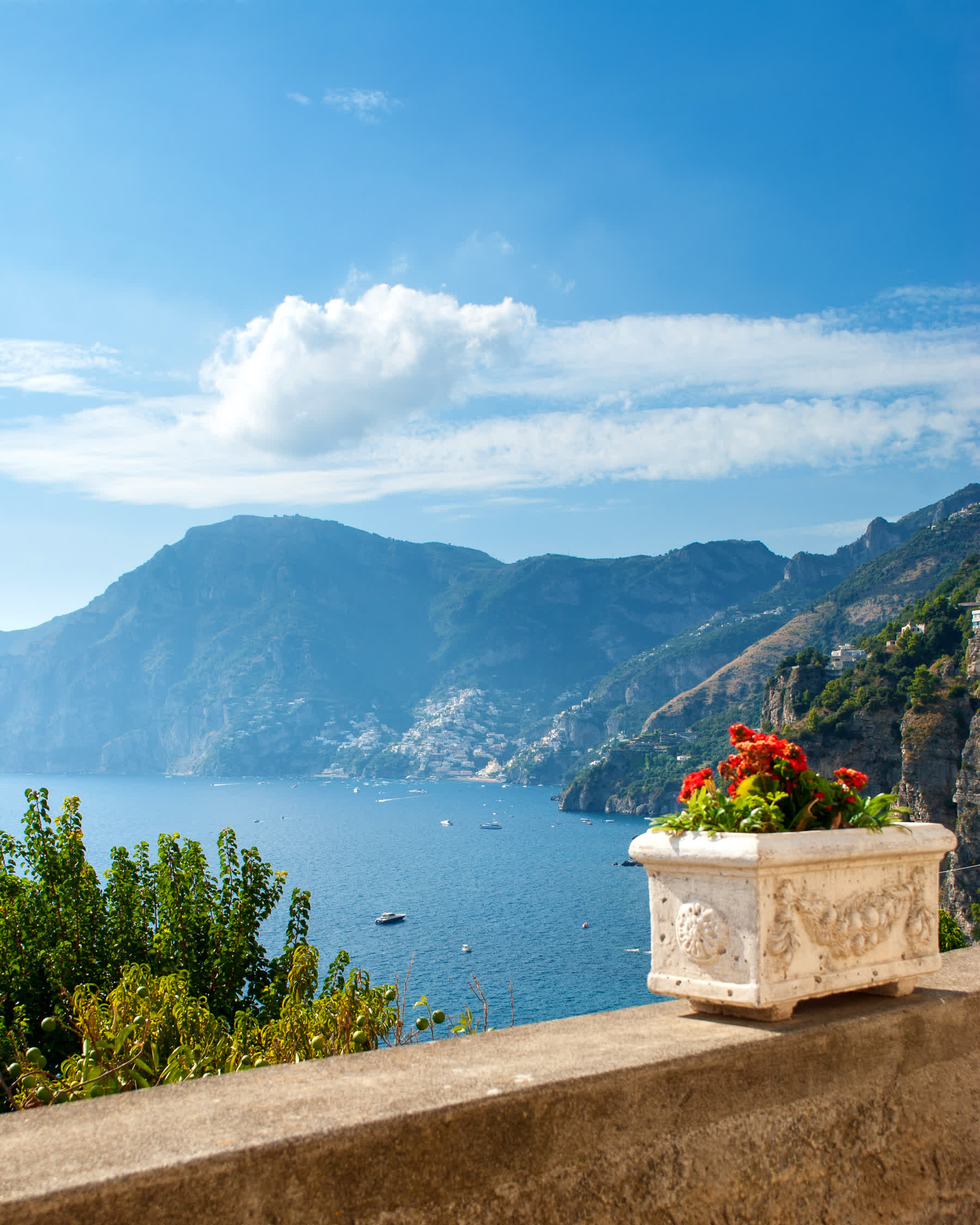 Praiano stacked on the Amalfi Coast cliff, civic height and stair logic for romance readers
