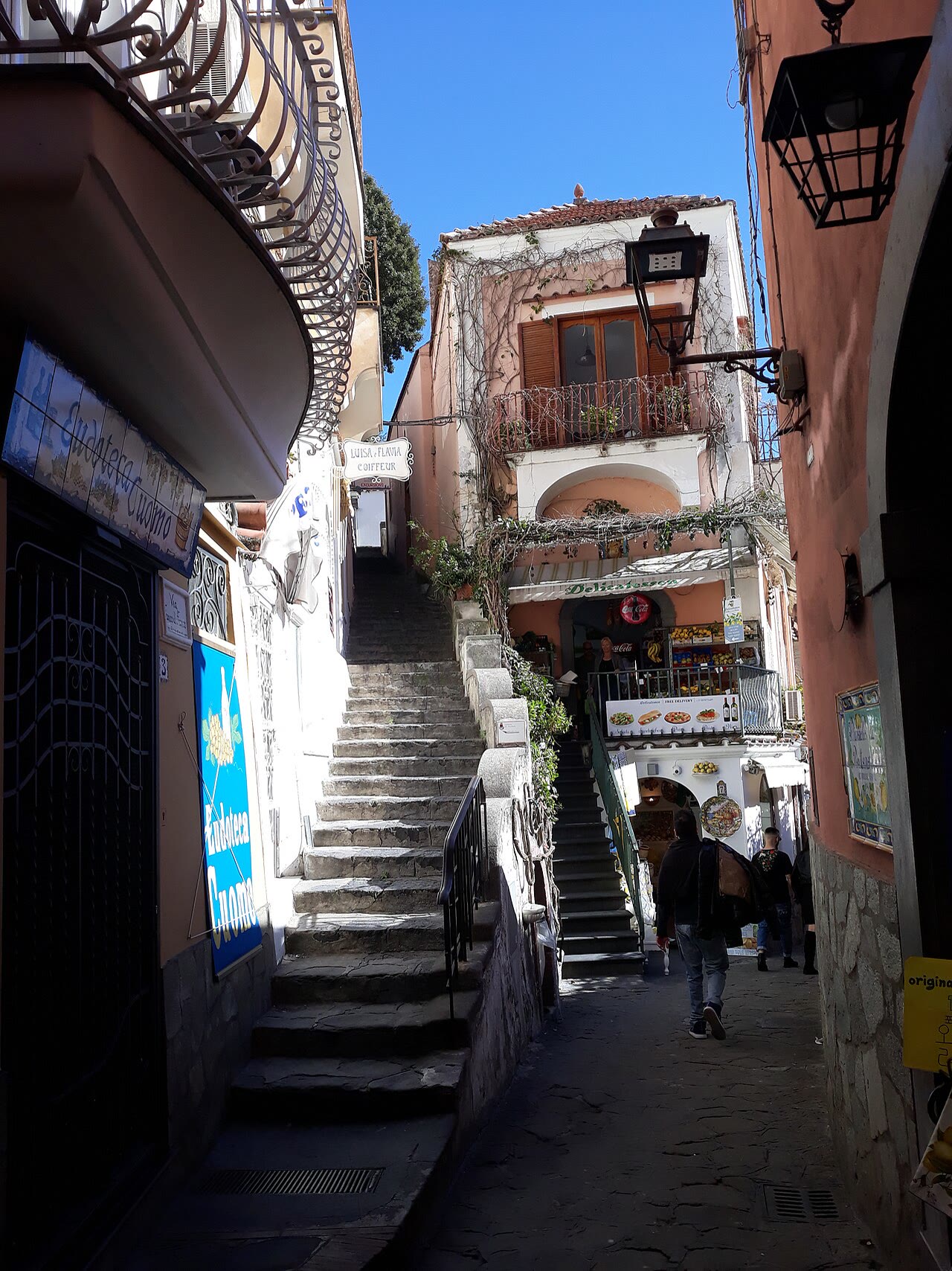 Positano stairs for romance readers with vertical inconvenience honesty and shared landings still named