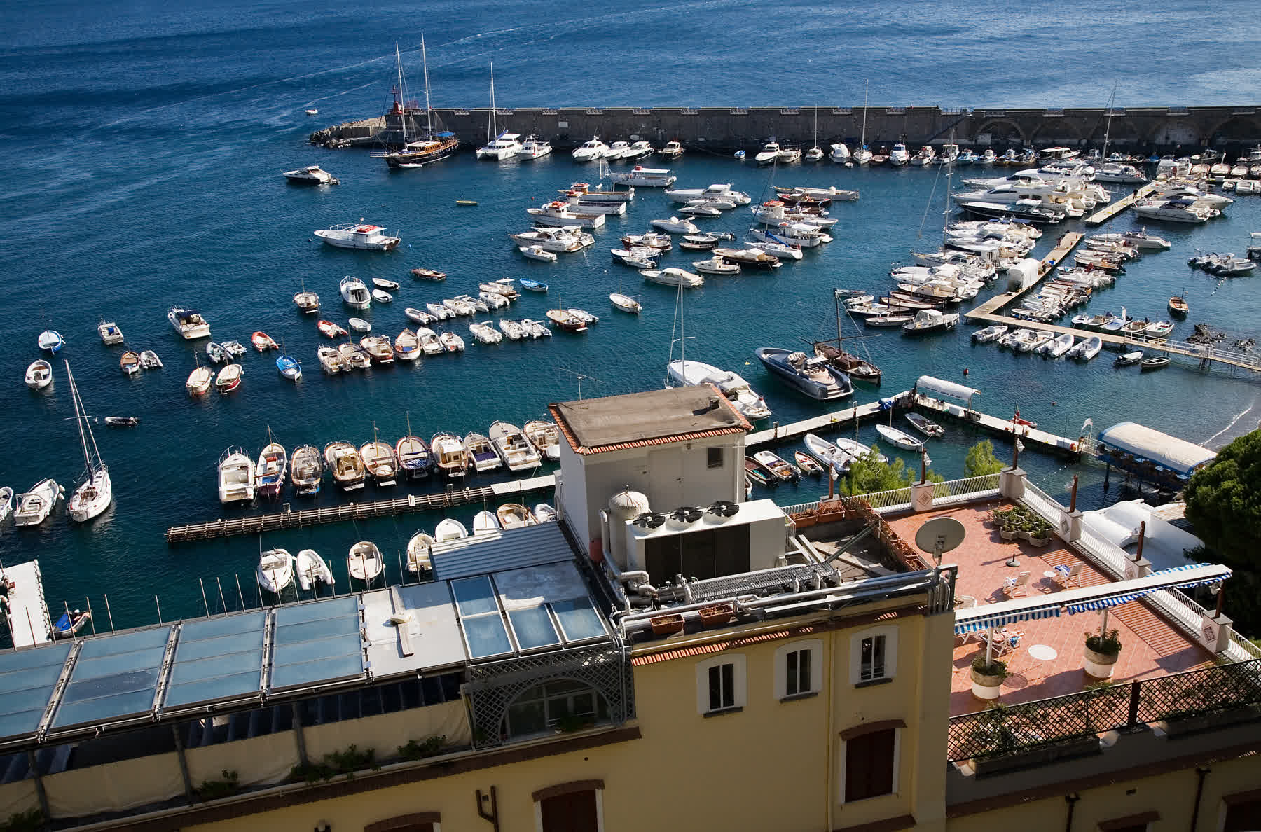 Amalfi terraces and harbor under hard light, civic pressure second chance romance Italy needs instead of spa reset