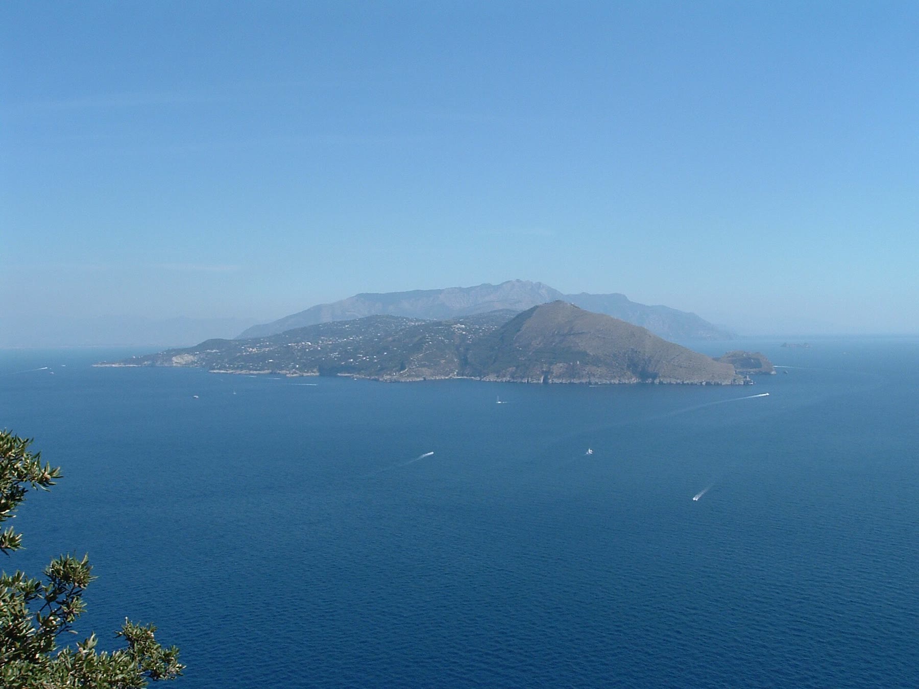 Punta Campanella sea-gate climate with shared trail density and Capri view honesty still named